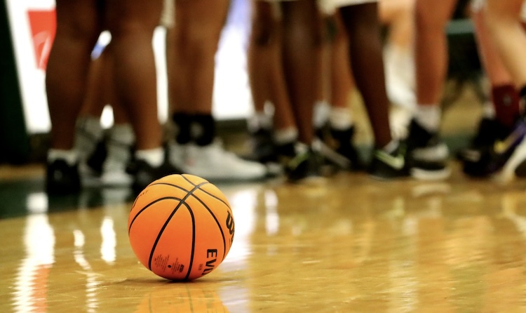 core values for athletes basketball on hardwood court during timeout